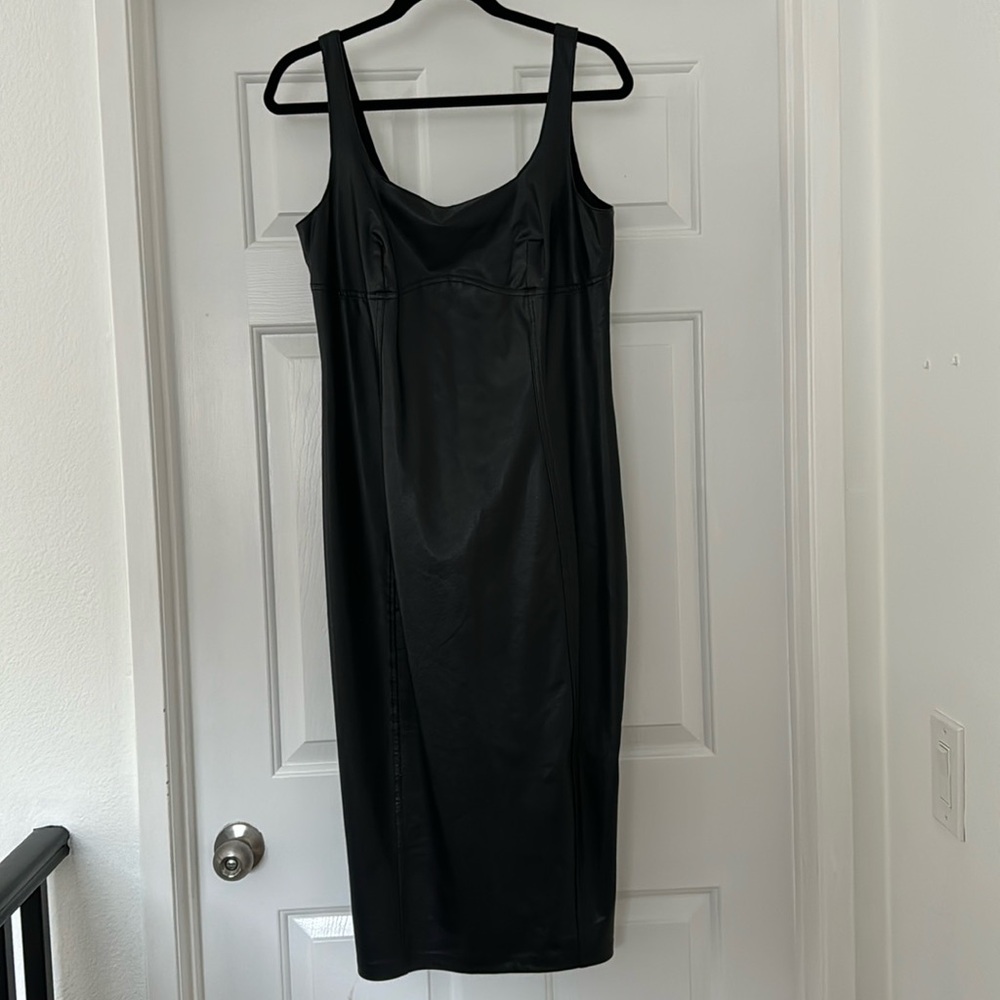 Black Form Fitting  Leather Dress. size XL